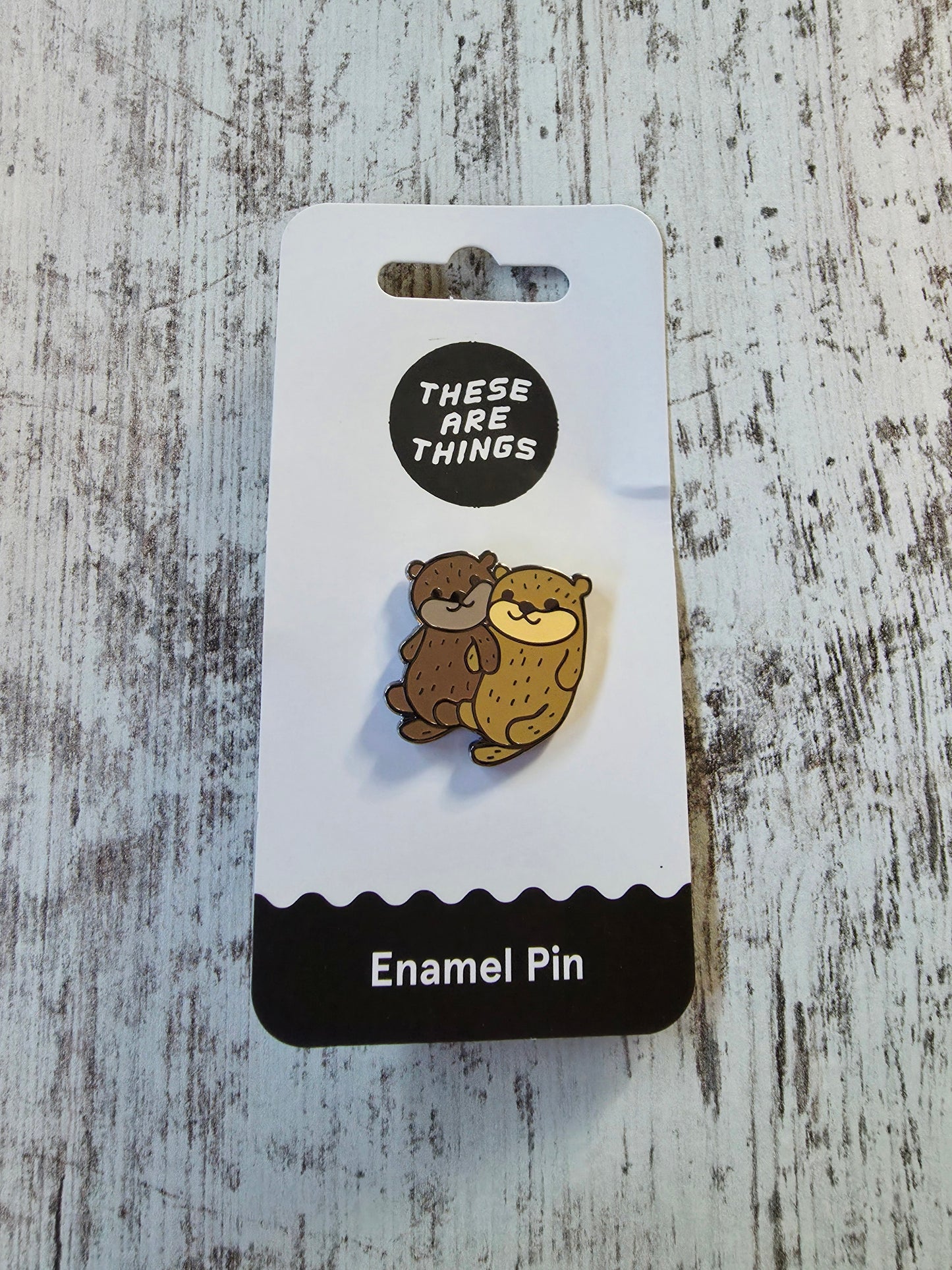 Holding Hands Otters Enamel Pin