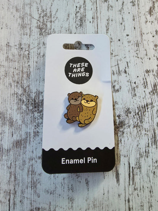 Holding Hands Otters Enamel Pin